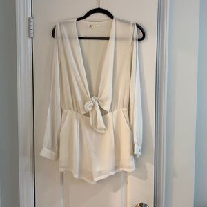 White polyester shoulder cut romper